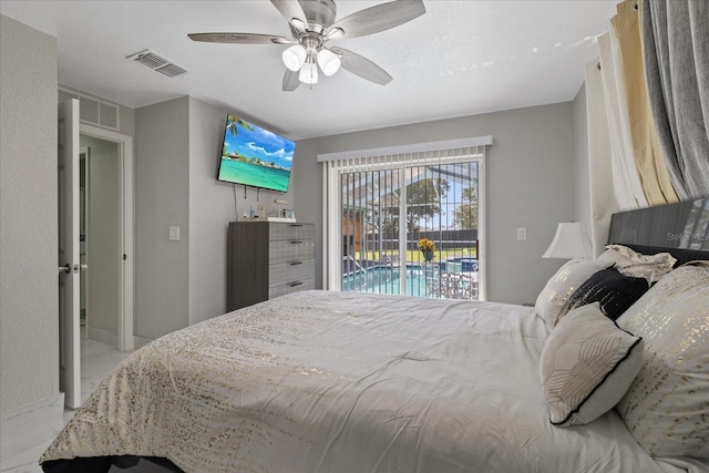 bedroom featuring ceiling fan and access to outside