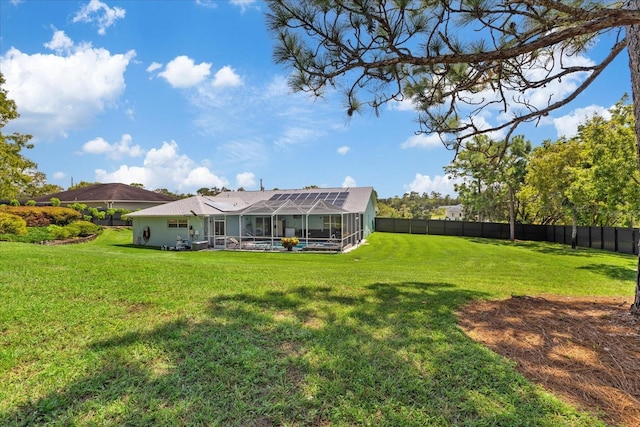 view of yard featuring a lanai and a pool