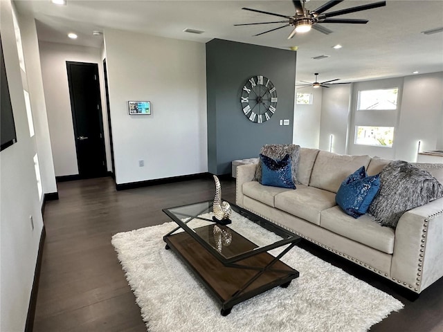 living room featuring dark hardwood / wood-style flooring