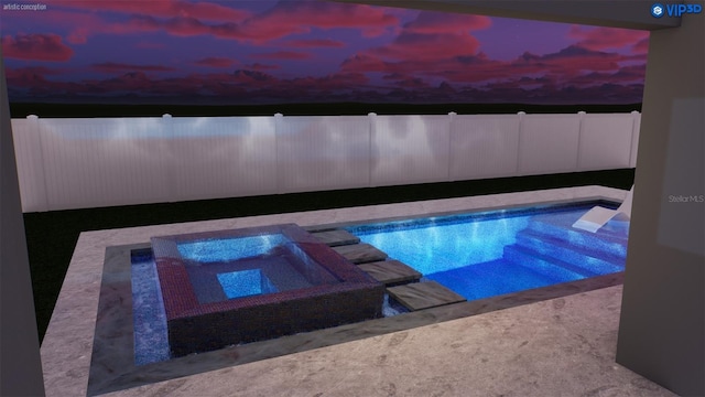 pool at dusk with an in ground hot tub