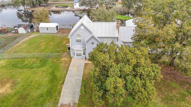 birds eye view of property featuring a water view