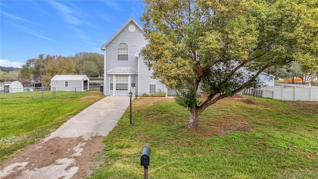 view of property featuring a front yard