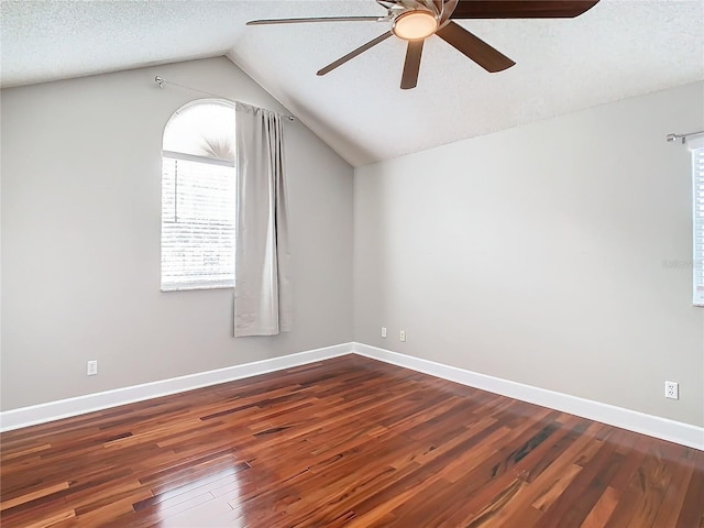 bonus room with hardwood / wood-style floors, ceiling fan, a textured ceiling, and vaulted ceiling