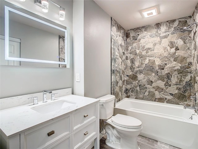 full bathroom with vanity, toilet, and shower / washtub combination