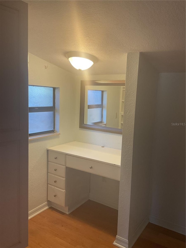 bathroom featuring hardwood / wood-style flooring