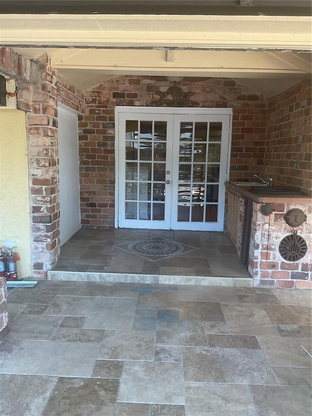 doorway to property featuring french doors