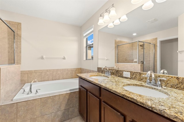 bathroom with separate shower and tub and vanity