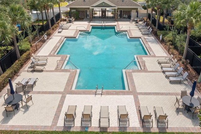 view of swimming pool featuring a patio area