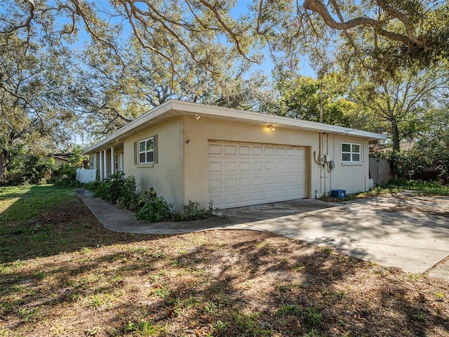 view of property exterior featuring a garage