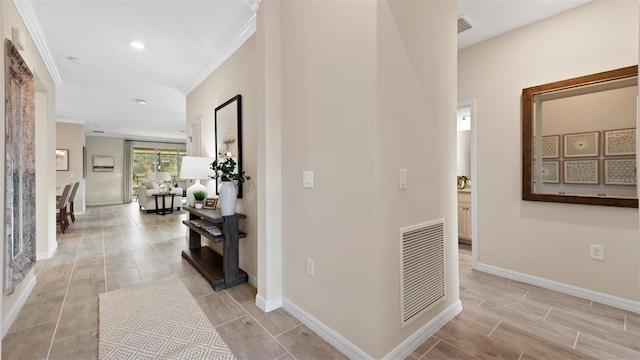 hallway with crown molding