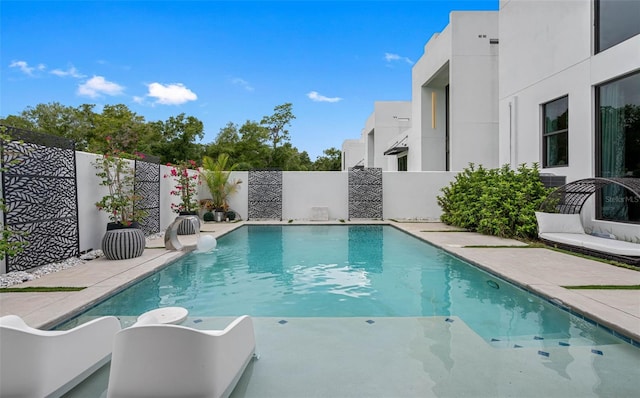 view of pool with a fenced backyard and a fenced in pool