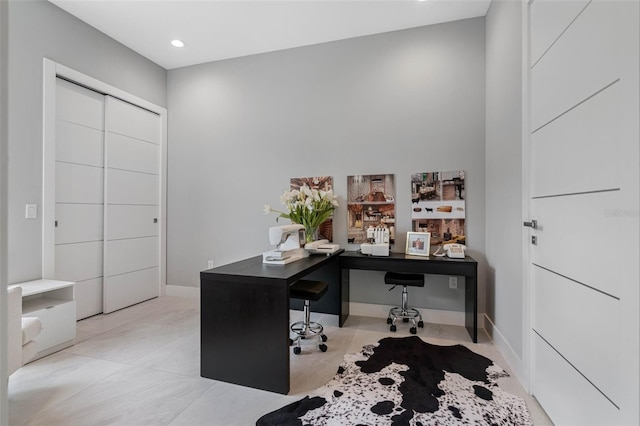 office with light tile patterned floors, recessed lighting, and baseboards