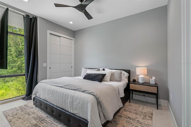 bedroom featuring recessed lighting, a closet, baseboards, and ceiling fan