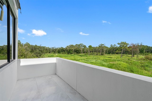 balcony with a wooded view