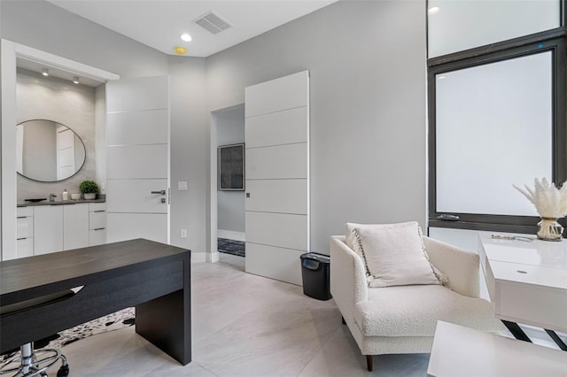 office area with visible vents and recessed lighting