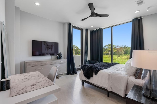 bedroom featuring recessed lighting, visible vents, a ceiling fan, and floor to ceiling windows