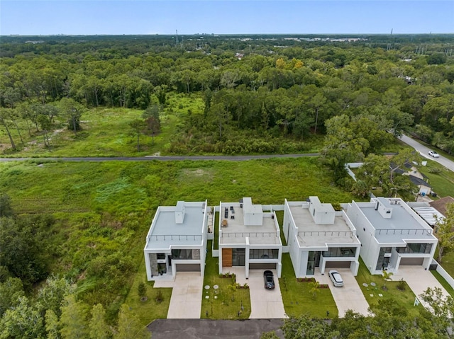 aerial view with a wooded view