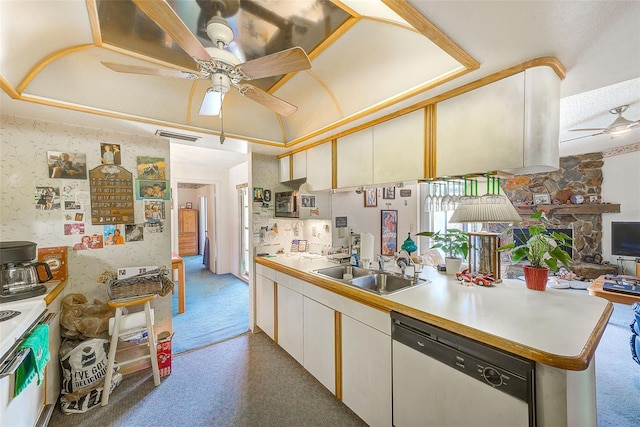 kitchen featuring ceiling fan, dishwasher, sink, carpet floors, and white cabinets