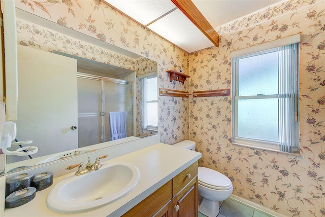 bathroom with toilet, a shower with door, vanity, and tile patterned flooring