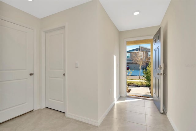 interior space with light tile patterned floors