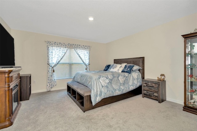 bedroom with light carpet