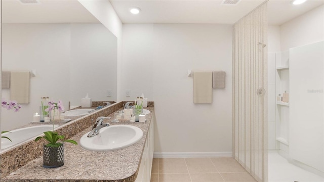 bathroom featuring tile patterned floors, walk in shower, and sink