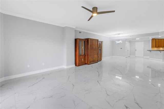 unfurnished living room featuring ceiling fan with notable chandelier and ornamental molding