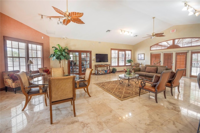 living room with french doors, vaulted ceiling, and ceiling fan