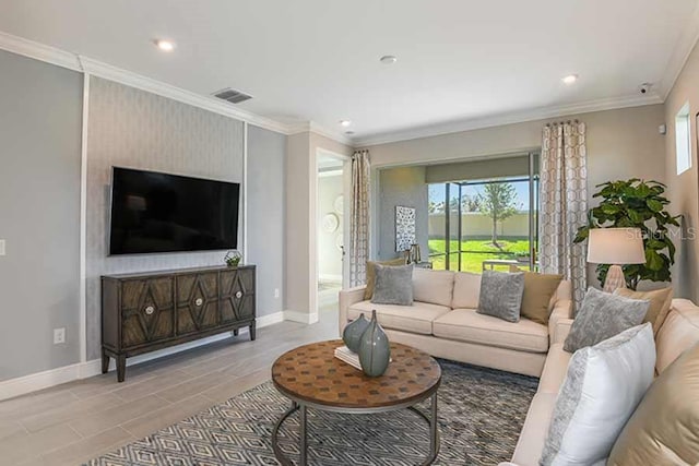 living room featuring ornamental molding and light hardwood / wood-style flooring