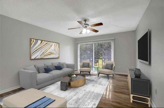 living room with a textured ceiling, dark hardwood / wood-style floors, and ceiling fan