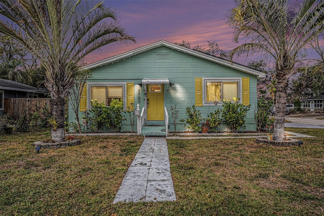 bungalow with a lawn