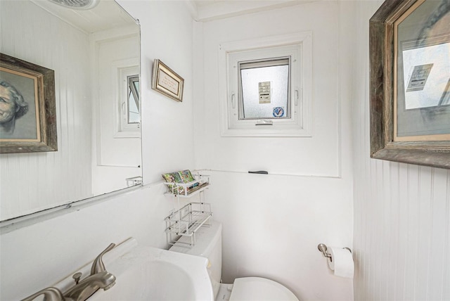 bathroom with sink and toilet