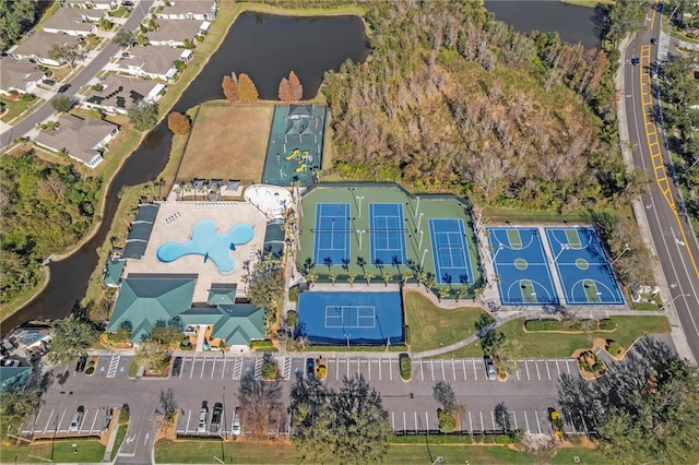 aerial view with a residential view and a water view