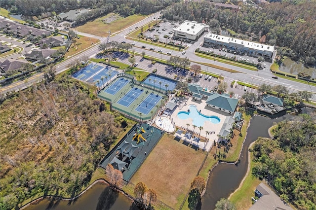 birds eye view of property featuring a water view