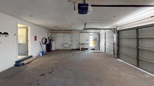 garage with sink and a garage door opener