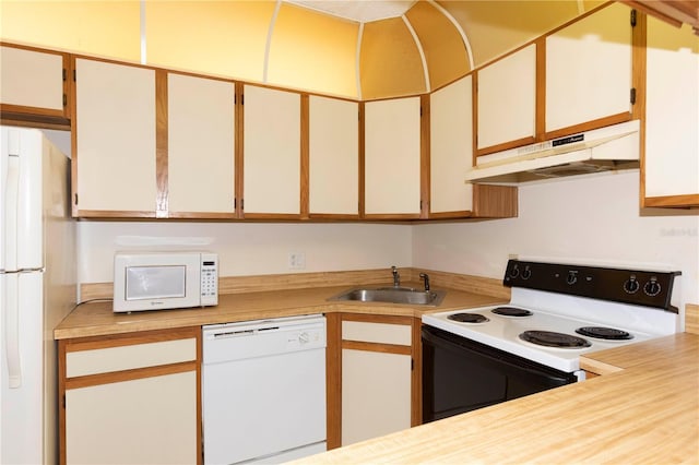 kitchen featuring white cabinetry, white appliances, and sink