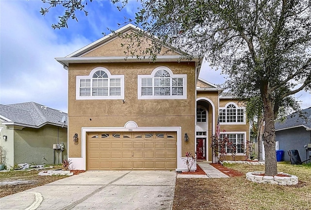 front of property featuring a garage