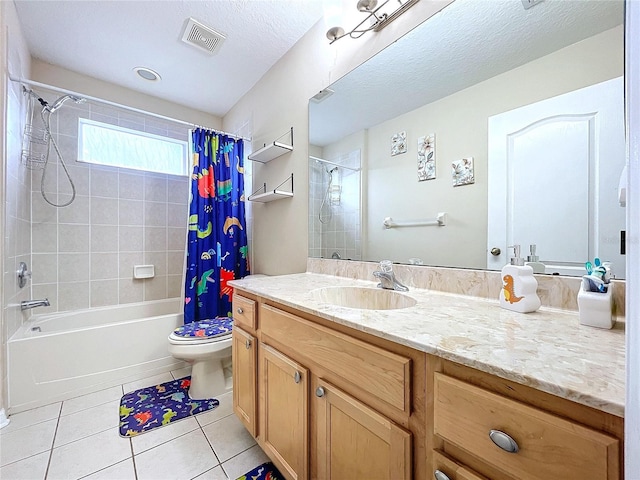 full bathroom featuring tile patterned flooring, a textured ceiling, toilet, shower / bath combo with shower curtain, and vanity