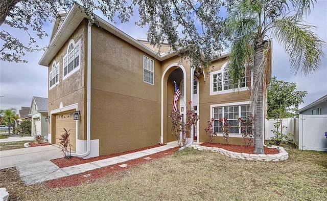 view of front of property with a garage