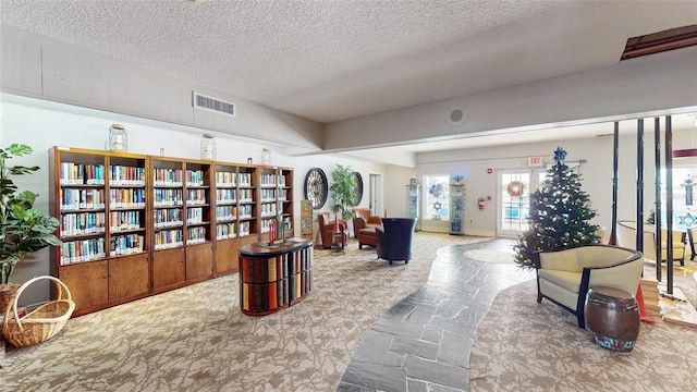 interior space featuring a textured ceiling