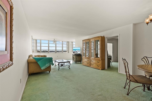 sitting room with light colored carpet