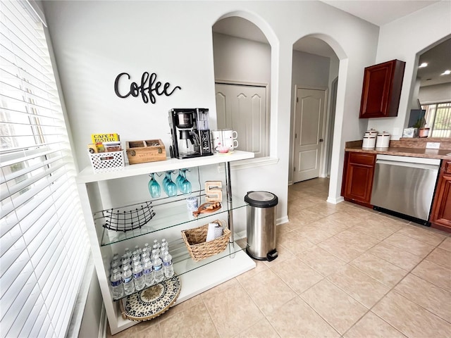 kitchen with dishwasher and light tile patterned floors