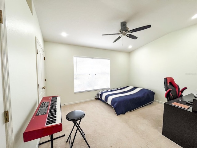 bedroom featuring ceiling fan and light carpet