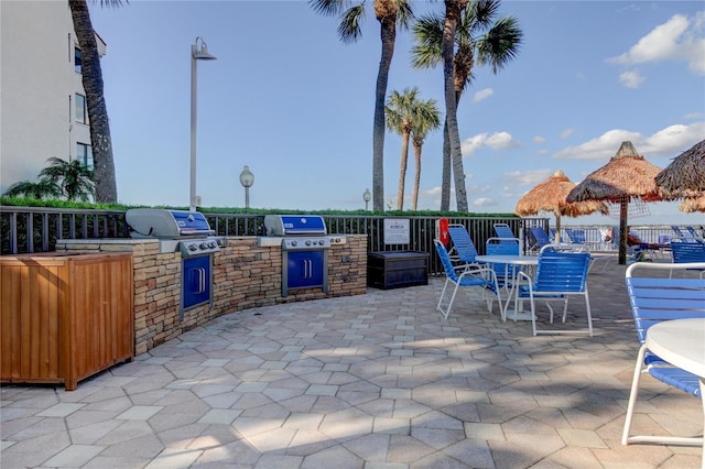 view of patio featuring area for grilling and an outdoor kitchen