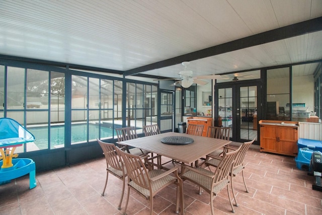 sunroom with french doors and ceiling fan