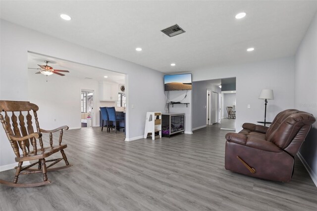 1009 Black Knight Dr, Valrico, FL 33594 - living room with wood finished floors, recessed lighting, and ceiling fan