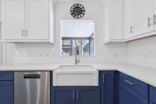 1009 Black Knight Dr, Valrico, FL 33594 - kitchen with dishwasher, blue cabinets, light countertops, and white cabinetry