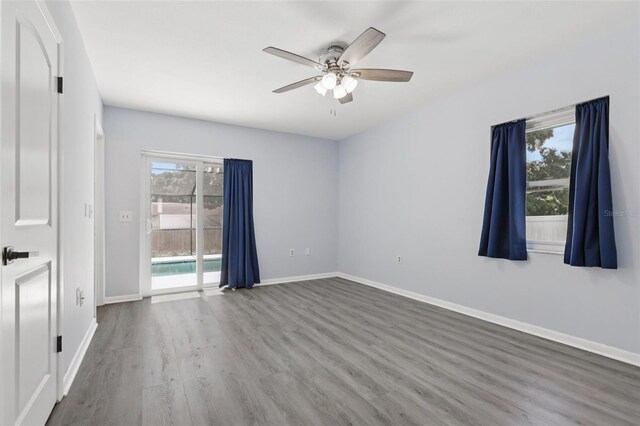 1009 Black Knight Dr, Valrico, FL 33594 - empty room with ceiling fan and wood finished floors