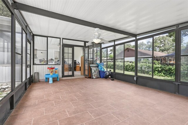 1009 Black Knight Dr, Valrico, FL 33594 - unfurnished sunroom featuring ceiling fan and plenty of natural light