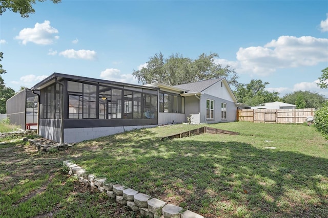 1009 Black Knight Dr, Valrico, FL 33594 - back of house featuring a sunroom